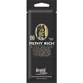 1 free packet Filthy Rich Ultra Rich Black Bronzer .5oz COLOR of LOTION is SUPER DARK